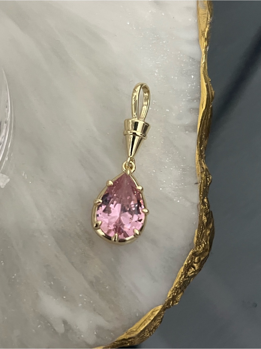 Pink cz pear-cut pendant in yellow gold-tone setting